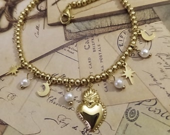 Bracciale in acciaio con sacro cuore perle luna stelle placcato oro