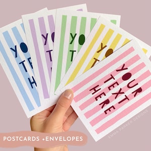 May include: A set of five rectangular postcards featuring vertical stripes in blue, purple, green, yellow, and pink. Each card displays the text YOUR TEXT HERE in a bold, dark-coloured font. The cards are arranged in a fan shape, showcasing the variety of pastel colours and the clear, legible typography on each individual postcard.