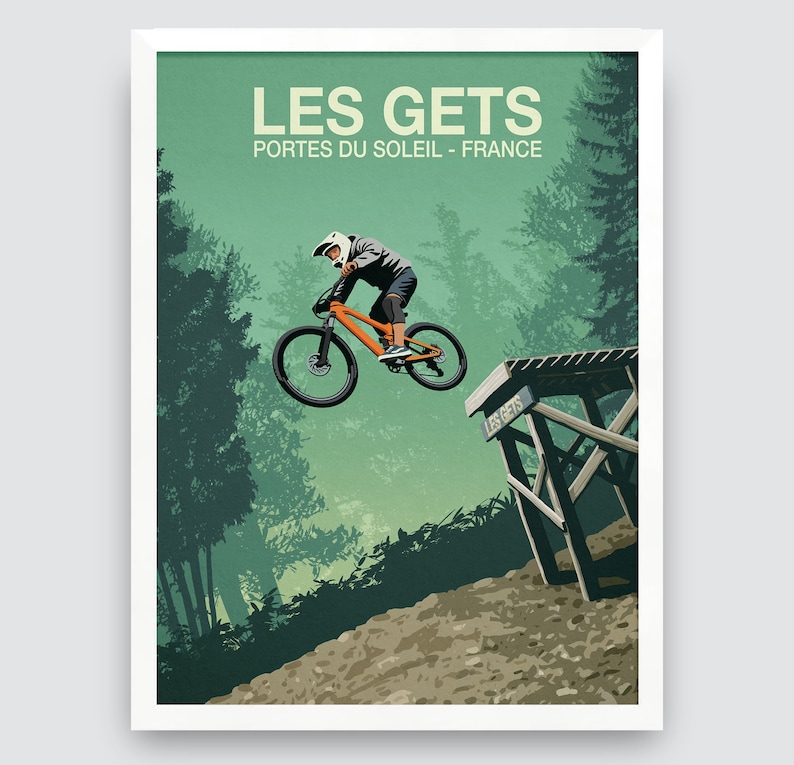 May include: A vintage-style poster with a green background featuring a mountain biker in mid-air, performing a trick on a dirt jump. The poster has the text "LES GETS" and "PORTES DU SOLEIL - FRANCE" in white.