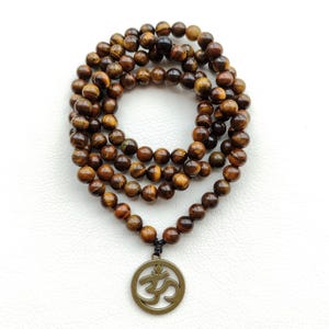 108 mala prayer bead necklace Tigers eye mala beads Om pendant necklace
