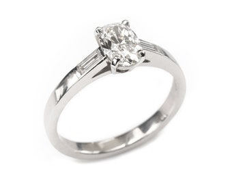 Modern Oval Diamond And Platinum Solitaire Ring, 0.91 Carats