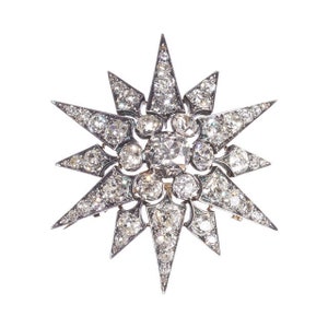 Antique Diamond and Silver Upon Gold Twelve Point Star Brooch, Circa 1880, 11.26 Carats