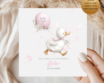 May include: A baby girl greeting card featuring a watercolor illustration of a white duckling running with a pink balloon that says "Baby Girl". The card includes the text "Welcome to the World" and the name "Betsie" with the date 02.04.2026.