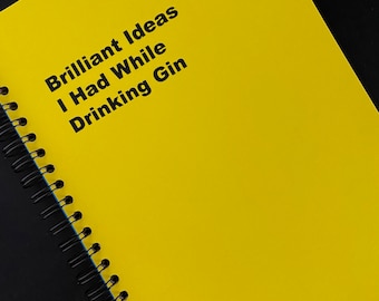 May include: A yellow spiral bound notebook with the text "Brilliant Ideas I Had While Drinking Gin" on the cover.