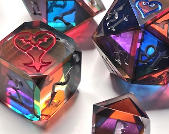 Dice into the Heart: Stained glass themed resin roleplaying Dice.