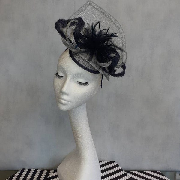 Navy blue and silver feather fascinator hatinator for weddings races special occasions Aintree Chester Cheltenham Royal Ascot races