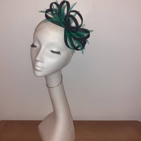Emerald green and black feather fascinator hatinator for weddings races and special occasions Aintree Chester Cheltenham Royal Ascot races