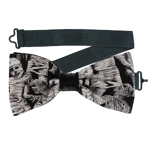 Le noeud papillon en tissu momie parfait pour les mariages de remise des diplômes ou le bal de promo peut également être porté comme noeud pour les cheveux. Costume d'Halloween momifié égyptien