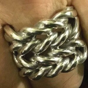 Keeper ring handmade from 925 sterling silver.  Hand woven & braided silver strands make up this incredible design.  Very chunky and heavy ring weighing approximately 34 - 38 grams
