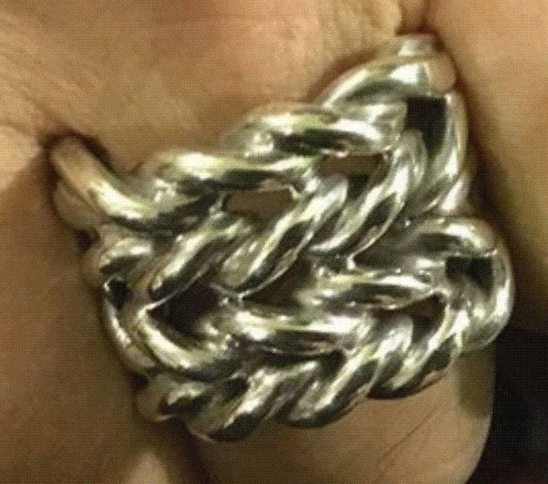 Keeper ring handmade from 925 sterling silver.  Hand woven & braided silver strands make up this incredible design.  Very chunky and heavy ring weighing approximately 34 - 38 grams