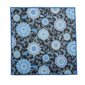 May include: A blue and gold patterned pocket square with a paisley design. The square is made of a soft, silky fabric and has a subtle sheen.