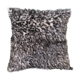 May include: A black and white faux fur throw pillow with a leopard print pattern.