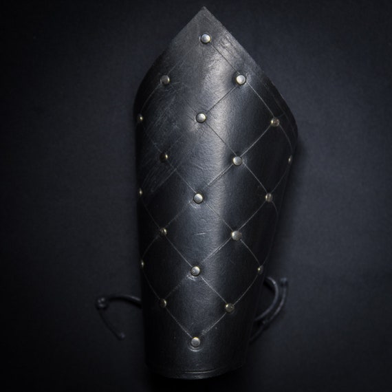 Studded store arm cuff