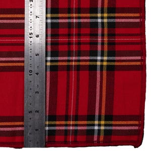 Traditional Red Stewart tartan Approximately 21" x 21" square bandana Handmade from polyester fabric.  You can wear it to cover your entire head, as a thin band, or as a wrist wrap.  May even fit your dog