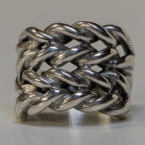 Keeper ring handmade from 925 sterling silver.  Hand woven & braided silver strands make up this incredible design.  Very chunky and heavy ring weighing approximately 34 - 38 grams