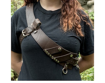 Great Bandolier handmade from Leather.  Fully adjustable, rings to attach utility accessories/pouches/holsters, ideal for pirates & cosplay