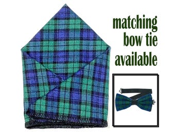 May include: A folded green, blue, and black plaid pocket square with a matching bow tie available.