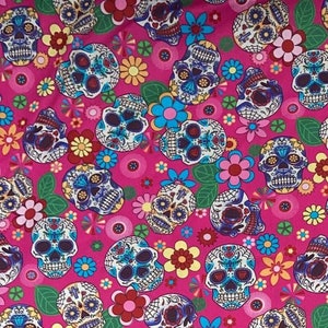 Great Day of the Dead design with candy/sugar skulls and flowers printed on a pink Bandana Headband Hair Tie Chemo Rose & Hubble Cotton