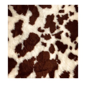 Ultra soft  and fluffy brown & cream guernsey cow faux fur fabric sold by the metre or yard 150cm wide x 100cm or 91.5cm perfect for making cushions, scarves, apparel, fancy dress up costumes