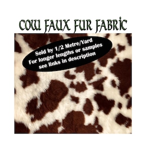 May include: Cow faux fur fabric with a brown and white pattern. The fabric has a soft, textured appearance. Text on the image reads "Sold by 1/2 Metre/Yard For longer lengths or samples see links in description."