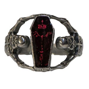 Coffin & Skeleton Ring .925 sterling silver. Blood Red Enamelled Coffin encasing a skeleton.  Held up by 2 skeletons which make up the band