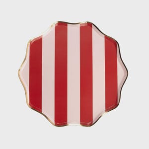 Könnte beinhalten: Ein dekorativer Teller mit gewelltem Rand und einem rot-weiß gestreiften Muster. Der Teller hat einen goldenen Rand. Dieser Teller eignet sich zum Servieren von Speisen auf einer Party oder Veranstaltung.