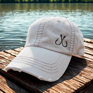 Women&#39;s Fishing Hat: Embroidered Crossed Hooks, Distressed Baseball Cap, Small Corner Design