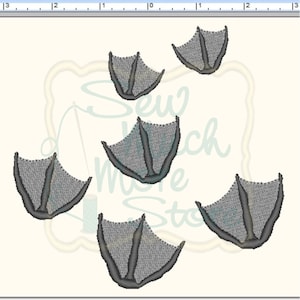 May include: Six gray duck footprints on a white background. The footprints are arranged in a random pattern.