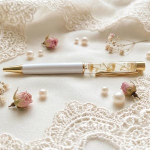 Pennen met gedroogde bloemen - Balpen met zwarte inkt en zwevende, natuurlijke bloemen - Elegant cadeau voor vrouwen - Inclusief fluwelen etui