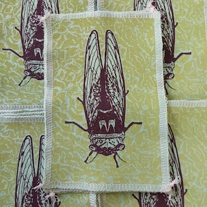 Cicada patch: screen printed made on recycled tshirt material for clothing projects by blobdogCo