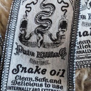 Vintage Snake Oil Patch: Zeefdruk opnaaiapplicatie voor kleding, tassen, rugzakken en jassen. afbeelding 3