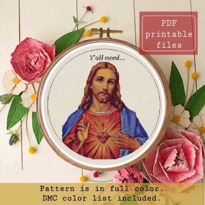 Può includere: Uno schema di punto croce con un ritratto di Gesù con il testo "Y'all need..." sopra l'immagine. Lo schema è a colori e include un elenco di colori DMC. Lo schema è disponibile come file PDF stampabile.