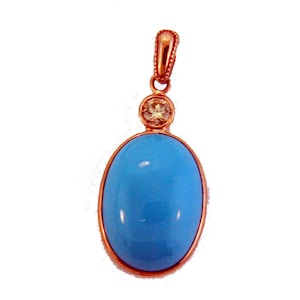 Large Turquoise, Sleeping Beauty, Natural Arizona Turquoise Flanked with 0.20 Carats of Round Brilliant  Diamond.  Set in 14k Rose Gold.