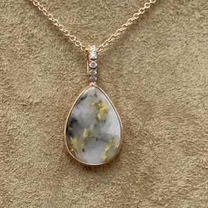 Pear Shaped Gold Quartz and Diamond Pendant Set in 14k Rose Gold.