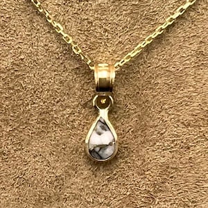 Small Pear Shaped Gold Quartz  Pendant Set in 14k Yellow Gold.