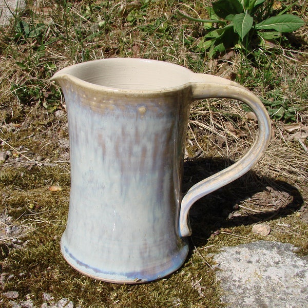 Beige pitcher with sandstone effect