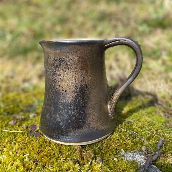 Old gold stoneware pitcher