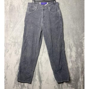 May include: Grey corduroy trousers with a straight leg. The trousers have a button and zip closure, front and back pockets, and belt loops. The trousers are hanging on a black hanger.
