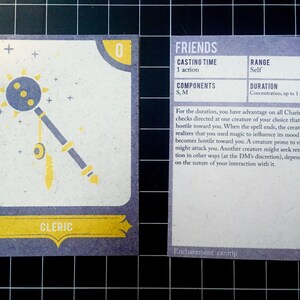 May include: A purple and yellow card with the title "FRIENDS" and the text "Enchantment cantrip". The card describes a spell that allows a cleric to make a creature friendly for a short time.