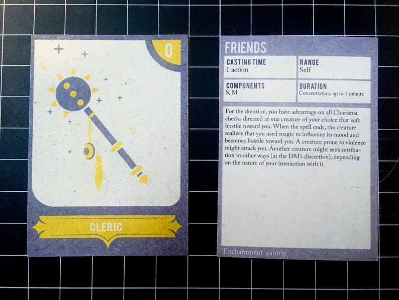May include: A purple and yellow card with the title "FRIENDS" and the text "Enchantment cantrip". The card describes a spell that allows a cleric to make a creature friendly for a short time.