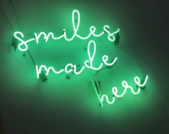 Smiles Made Here - Glass Neon Sign