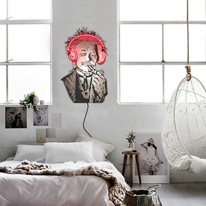 May include: A neon sign depicting a man with a mustache wearing headphones and smoking a pipe. The sign is mounted on a white wall in a bedroom setting.