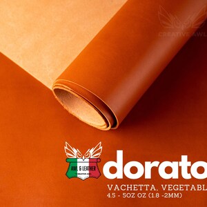 Puede incluir: Un rollo de cuero naranja etiquetado "dorato VACHETTA, VEGETABLE TANNED 4.5 - 5OZ OZ (1.8-2MM)"