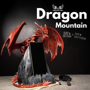May include: A red and black dragon sculpture with outstretched wings, perched atop a stylized mountain structure. The words "Dragon Mountain" are displayed in white text. The image also includes the text "DXF & PDF PATTERN".