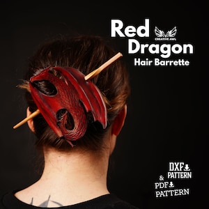 May include: Red leather dragon hair barrette with a wooden stick. The barrette is worn in a woman's hair. The text "Red Dragon Hair Barrette" is visible above the barrette. The text "DXF & PDF PATTERN" is visible below the barrette.