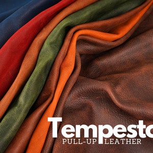 Op de afbeelding: Close-up van een selectie lederen swatches in verschillende kleuren, waaronder marineblauw, rood, groen, oranje en bruin. Het leer heeft een textuur en een natuurlijke, rustieke uitstraling. De tekst "Tempesto PULL-UP LEATHER" is onderaan de afbeelding gedrukt.