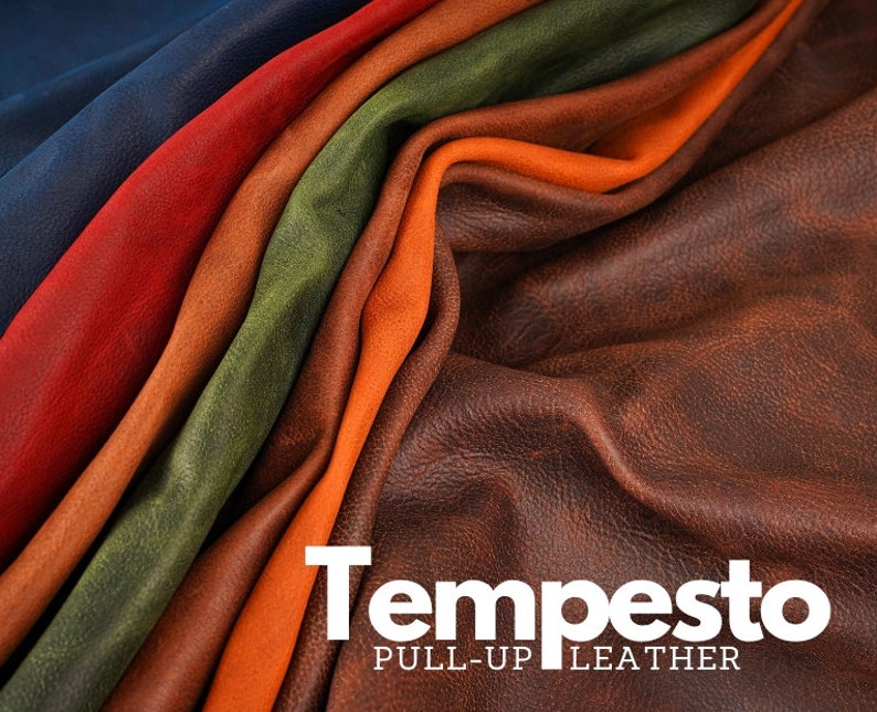 May include: Close-up of a variety of leather swatches in different colors, including navy blue, red, green, orange, and brown. The leather is textured and has a natural, rustic look. The text "Tempesto PULL-UP LEATHER" is printed at the bottom of the image.