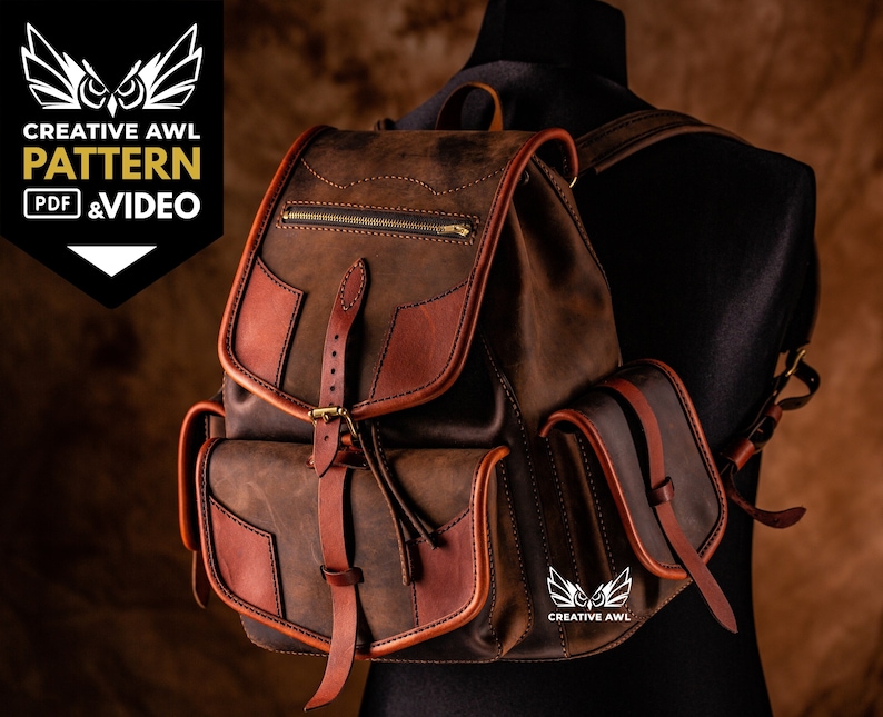 May include: A brown leather backpack with a flap closure and a buckle. The backpack has two side pockets and a zipped pocket on the front. The backpack is made of high-quality leather and has a distressed look. The backpack is a great option for everyday use or for travel.  "CREATIVE AWl PATTERN PDF & VIDEO" is printed on the left side of the image.