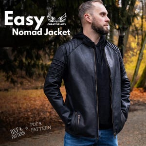 May include: Black leather Nomad Jacket with a zip-up front, side pockets, and ribbed detailing on the shoulders. The jacket is worn over a black hoodie. The words "Easy Nomad Jacket" are displayed in white text.