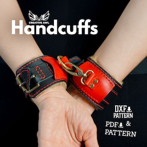 May include: Red and black leather handcuffs with gold-colored hardware. The word "Handcuffs" is displayed in white text. The cuffs are on a person's wrists, against a black and red background.